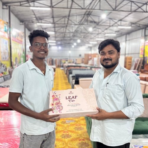 Customer poses with a furniture delivery from Leeway Furniture 3